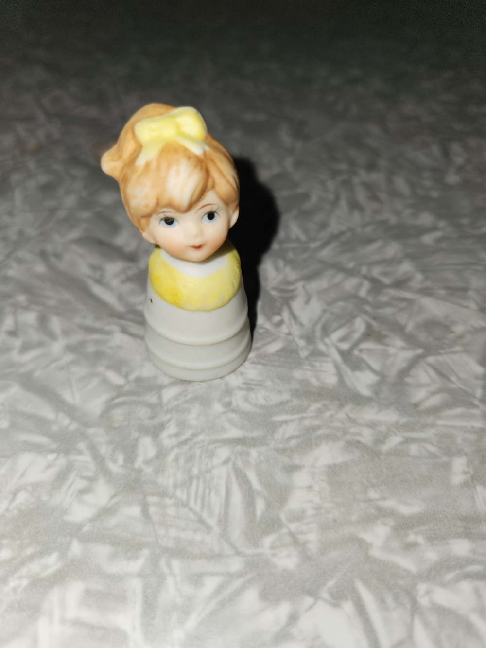 Porcelain Doll Accent Figurine with Yellow Bow